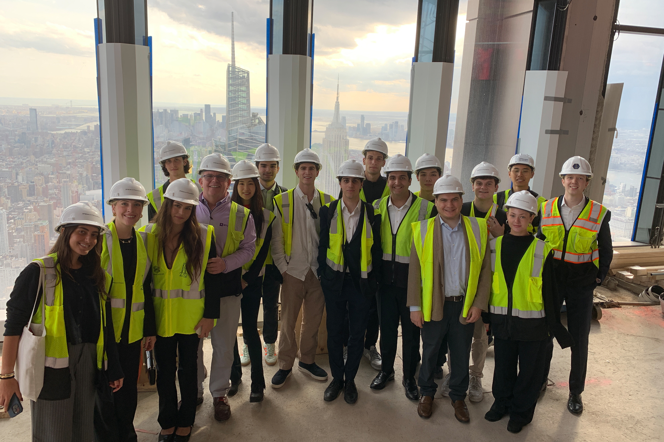 Group posing in hard hats.