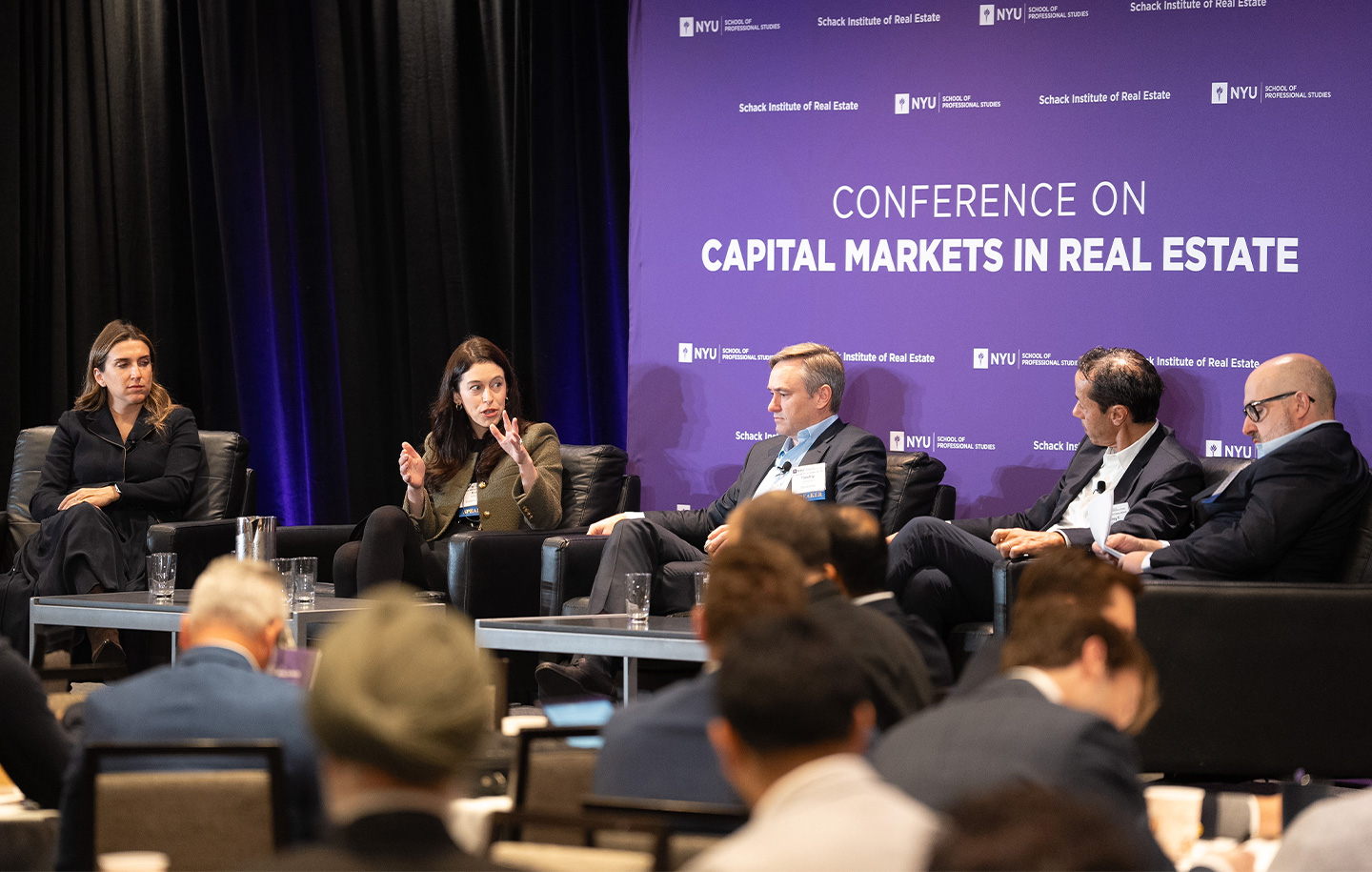 Schack Real Estate student engages in a Q&A during the Annual Capital Markets Conference