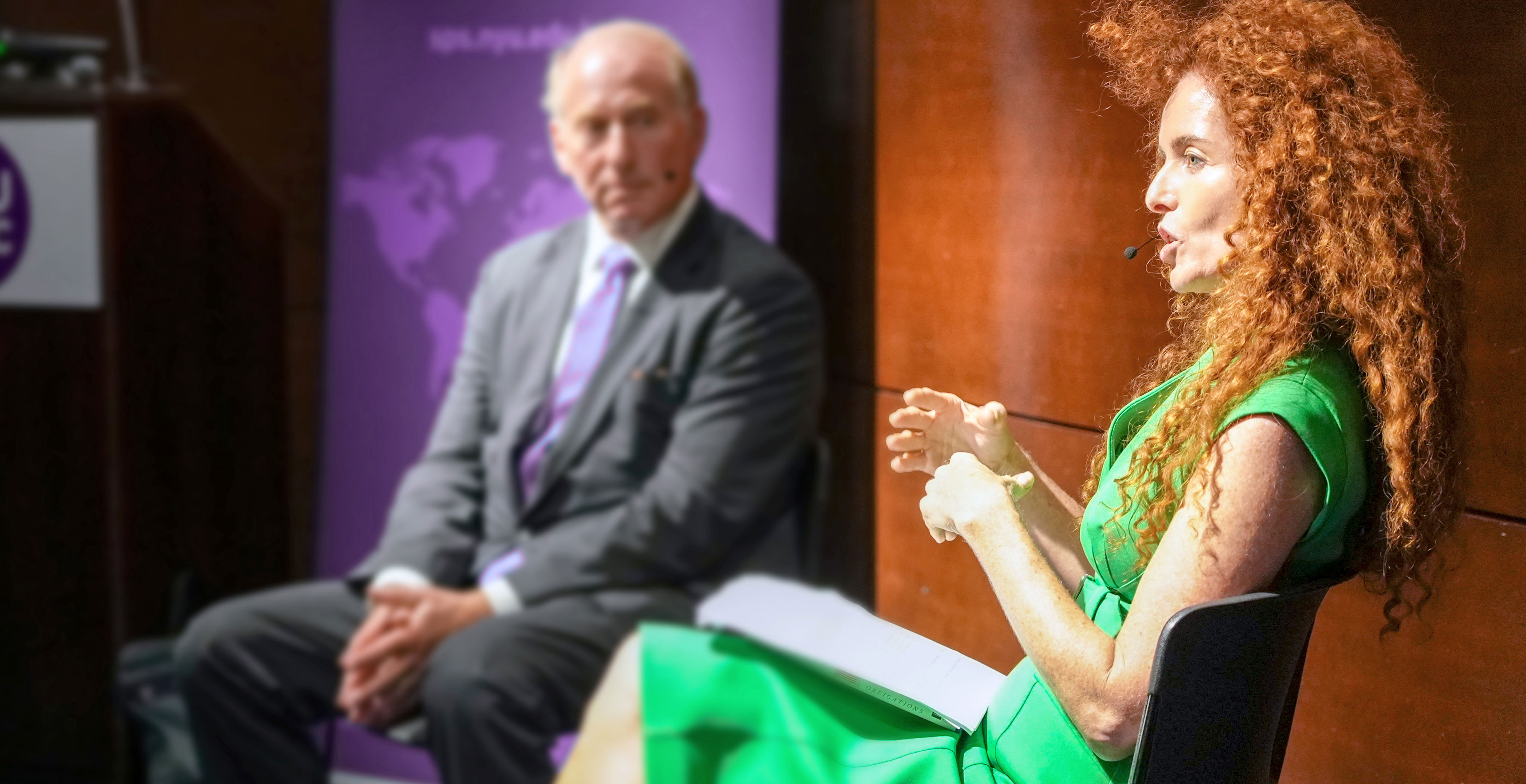 NYU SPS professor and Associate Dean of the Center for Global affairs Carolyn Kissane speaks on a stage with another faculty member